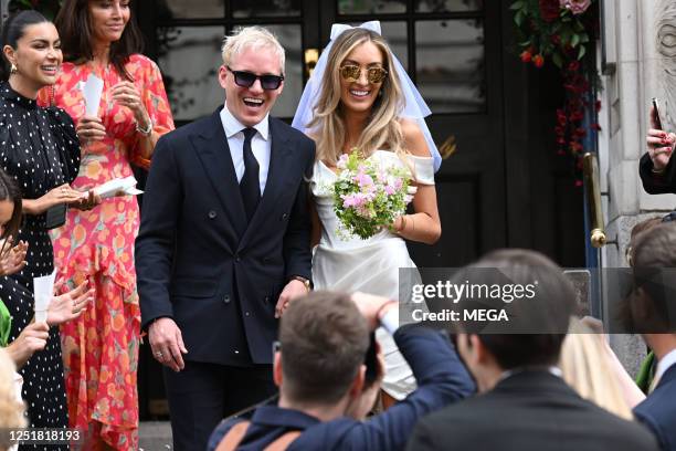 Jamie Laing and Sophie Habboo are seen leaving their wedding at Chelsea and Kensington registry office on April 14, 2023 in London, United Kingdom.