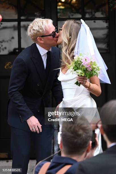 Jamie Laing and Sophie Habboo are seen leaving their wedding at Chelsea and Kensington registry office on April 14, 2023 in London, United Kingdom.