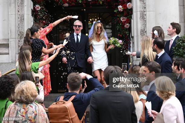 Jamie Laing and Sophie Habboo are seen leaving their wedding at Chelsea and Kensington registry office on April 14, 2023 in London, United Kingdom.