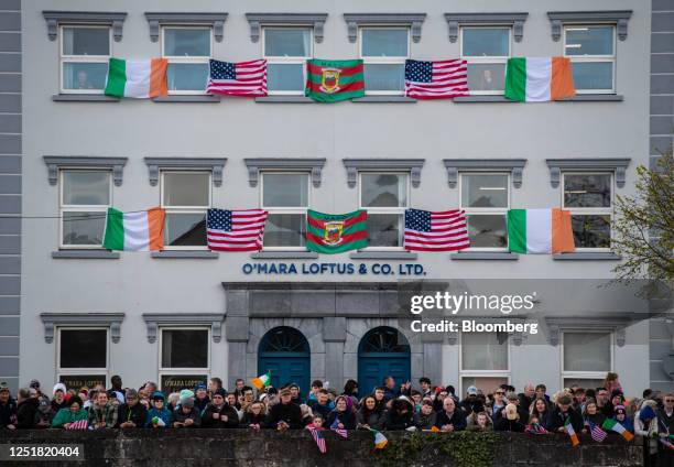 Residents ahead of a speech by US President Joe Biden at St Muredach's Cathedral in Ballina, Ireland, on Friday, April 14, 2023. Biden is in County...
