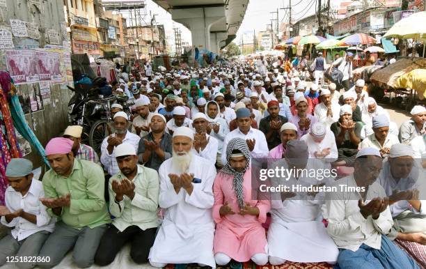 Muslim people offering Friday Namaz in front of a mosque during holy month of Ramadan near Patna Junction, on April 14, 2023 in Patna, India.