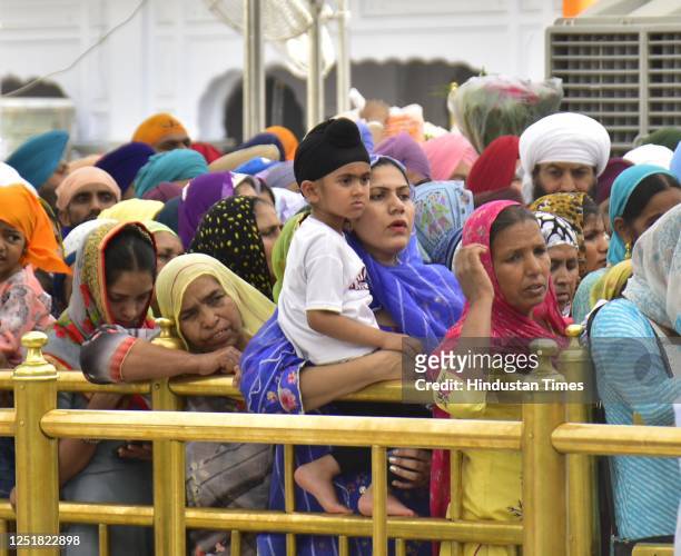 Devotees paying obeisance on the occasion of Baisakhi at Golden Temple, on April 14, 2023 in Amritsar, India. Baisakhi, also known as Vaisakhi, is an...
