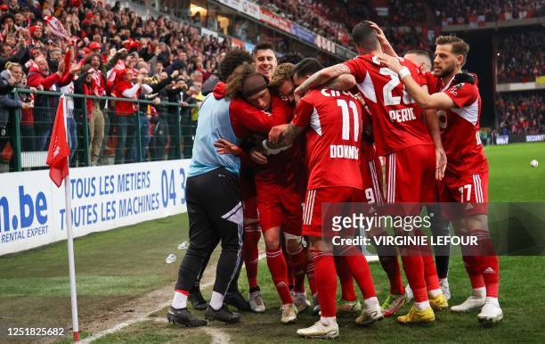 Standard's Marlon Fossey celebrates after scoring during a soccer match between Standard de Liege and Sporting Charleroi, Friday 14 April 2023 in...