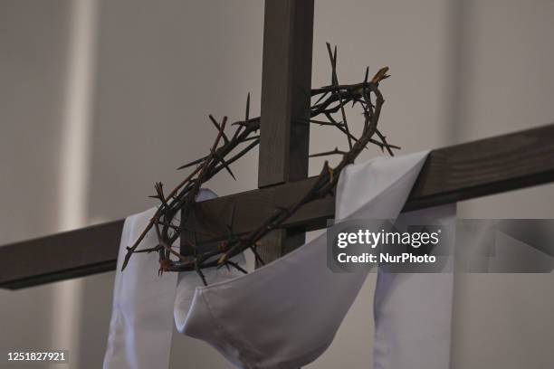 The barren cross in front of the altar seen during the Good Friday liturgy at the Dormition of the Virgin Mary Greek Catholic parish, located in the...