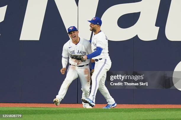 Daulton Varsho of the Toronto Blue Jays celebrates after catching a fly ball during the third inning of the game between the Tampa Bay Rays and the...