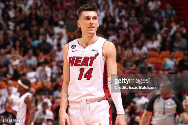 Tyler Herro of the Miami Heat looks on during the game against the Chicago Bulls during the 2023 Play-In Tournament on April 14, 2023 at the Kaseya...