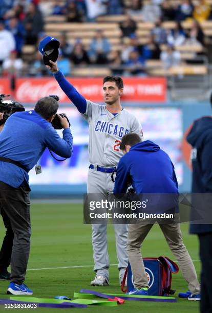 Cody Bellinger of the Chicago Cubs is honored by the Los Angeles Dodgers before the start of the game at Dodger Stadium on April 14, 2023 in Los...