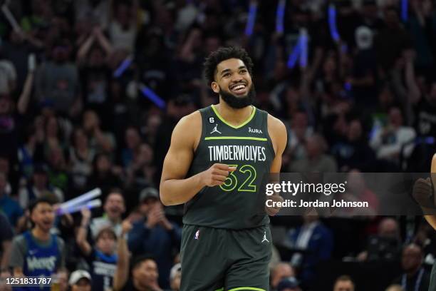 Karl-Anthony Towns of the Minnesota Timberwolves celebrates a play during the 2023 Play-In Tournament against the Oklahoma City Thunder on April 14,...