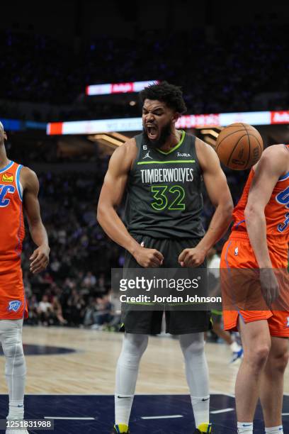 Karl-Anthony Towns of the Minnesota Timberwolves celebrates a play during the 2023 Play-In Tournament against the Oklahoma City Thunder on April 14,...