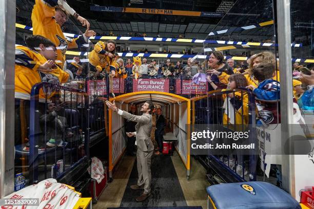 Roman Josi of the Nashville Predators signs autographs for fans following a 4-3 loss the the Colorado Avalanche at Bridgestone Arena on April 14,...