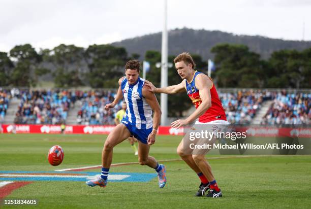 Harris Andrews of the Lions and Charlie Comben of the Kangaroos in action during the 2023 AFL Round 05 match between the Brisbane Lions and the North...