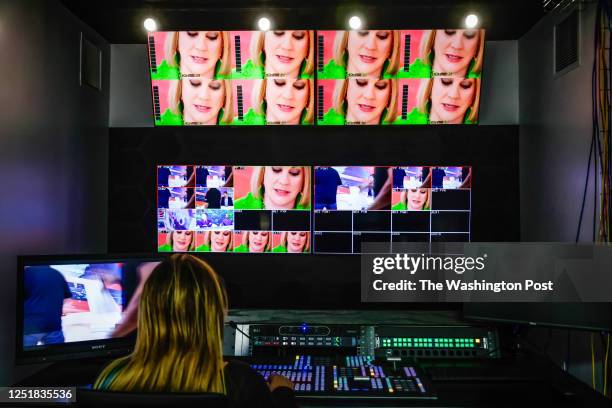 Americano Media news director and Actualidad anchor Lucia Navarro works on a run thru of her show with the crew in Americano Media's new studio in...