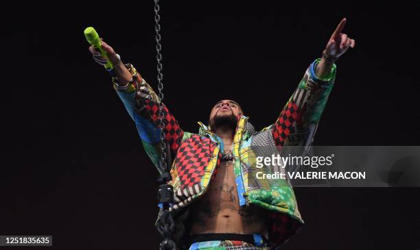Puerto Rican singer Bad Bunny performs during the first week-end of Coachella Valley Music and Arts Festival in Indio, California, on April 14, 2023.