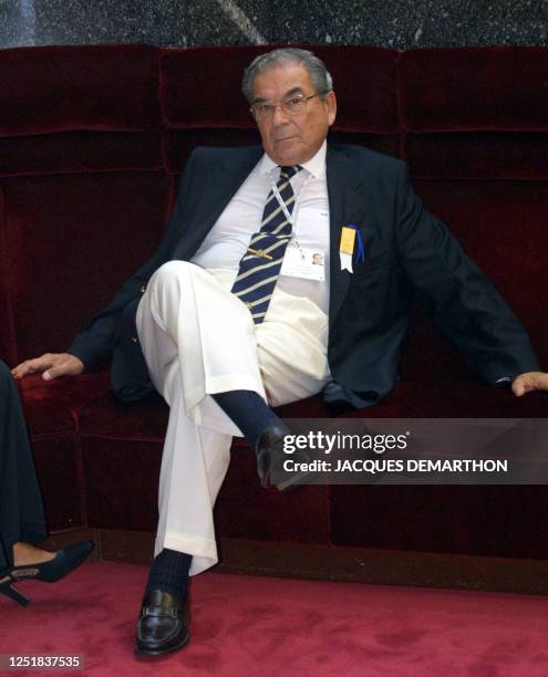 Portrait of Greek IOC member Nikos Filaretos taken 15 July 2001 during the 112th session of the International Olympic Committee in Moscow. The 112th...