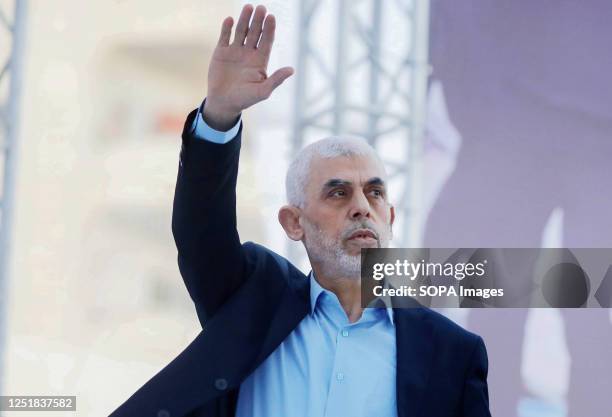 Yahya Sinwar, head of the Palestinian Islamic movement Hamas in the Gaza Strip, waves his hand to the crowd during the celebration of International...