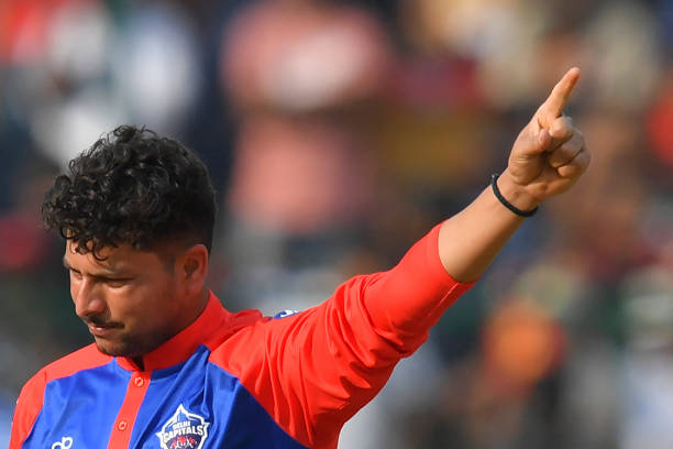 Delhi Capitals' Kuldeep Yadav reacts after the dismissal of Royal Challengers Bangalore's Glenn Maxwell during the Indian Premier League Twenty20...