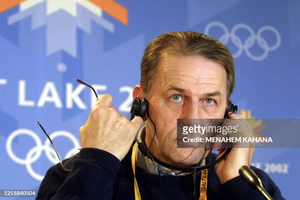 International Olympic Committee President Jacques Rogge addresses a press conference 07 February 2002 at the Media Center in Salt Lake City, one day...