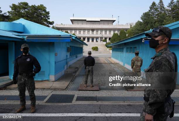 April 2023, South Korea, Joint Security Area: U.S. Army soldiers stand in the Joint Security Area of the demilitarized zone between North and South...