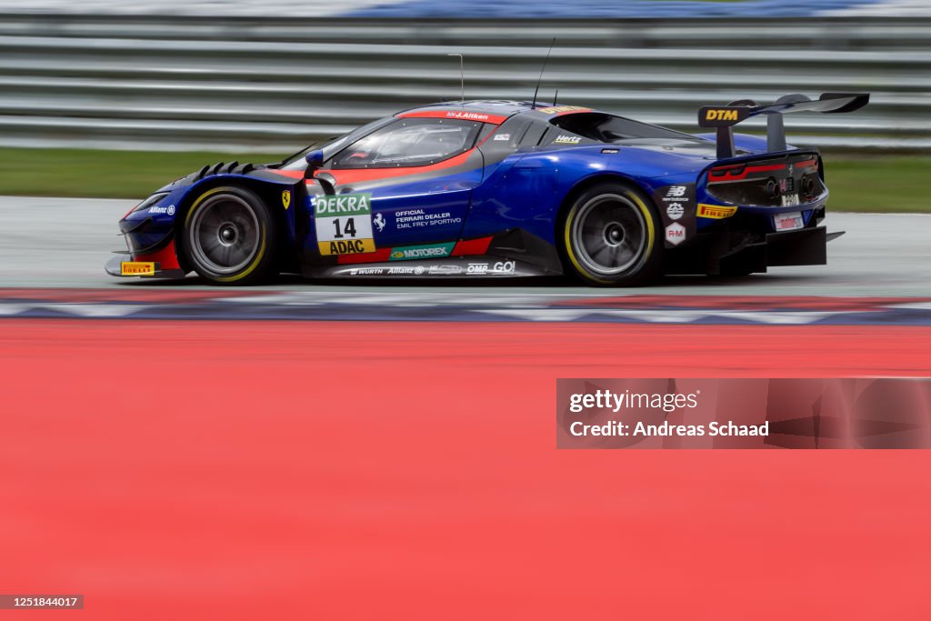Jack Aitken of Great Britain performs during the DTM test at Red Bull ...