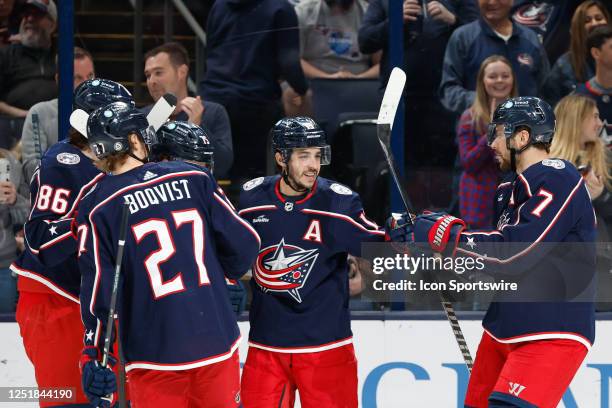 Columbus Blue Jackets left wing Johnny Gaudreau celebrates a first period goal against the Buffalo Sabres with his teammates on April 14 at...