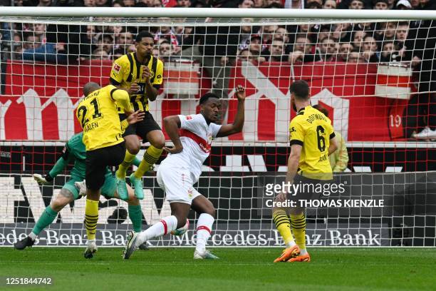 Dortmund's Dutch forward Donyell Malen scores 0-2 goal during the German first division Bundesliga football match between VfB Stuttgart and Borussia...