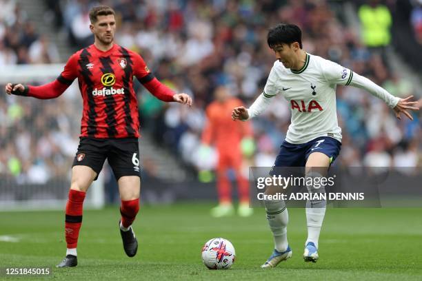 Tottenham Hotspur's South Korean striker Son Heung-Min controls the ball past Bournemouth's Welsh defender Chris Mepham during the English Premier...