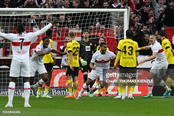 Stuttgart's German defender Josha Vagnoman scores the 2-2 equalizing goal during the German first division Bundesliga football match between VfB...