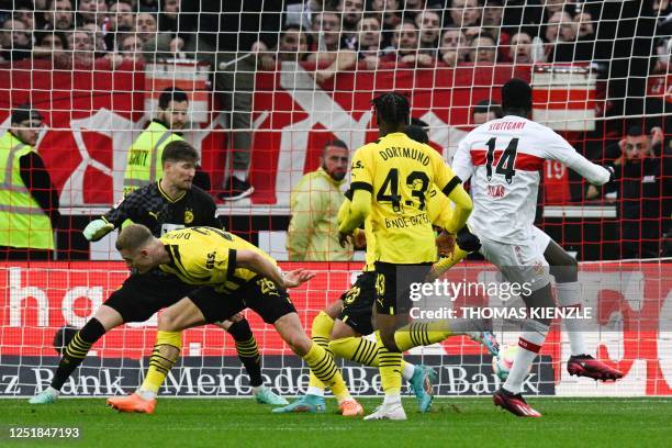 Stuttgart's Congolese midfielder Silas scores the 3-3 equalizing goal during the German first division Bundesliga football match between VfB...
