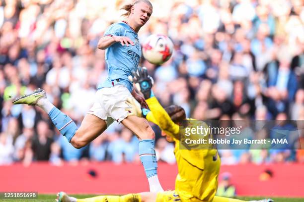 Erling Haaland of Manchester City scores a goal to make it 3-0 during the Premier League match between Manchester City and Leicester City at Etihad...
