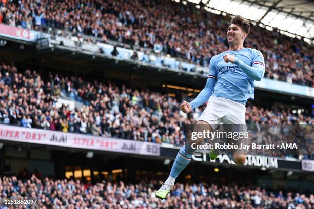 John Stones of Manchester City celebrates after scoring a goal to make it 1-0 during the Premier League match between Manchester City and Leicester...