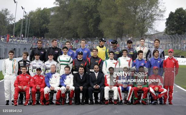 Founder, President and Chairman of A1 Grand Prix Sheikh Maktoum Hasher and Chief Executive Officer Tony Teixeira sit among the drivers on the track...