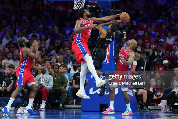 Joel Embiid of the Philadelphia 76ers blocks the shot of Mikal Bridges of the Brooklyn Nets in the second quarter during Game One of the Eastern...