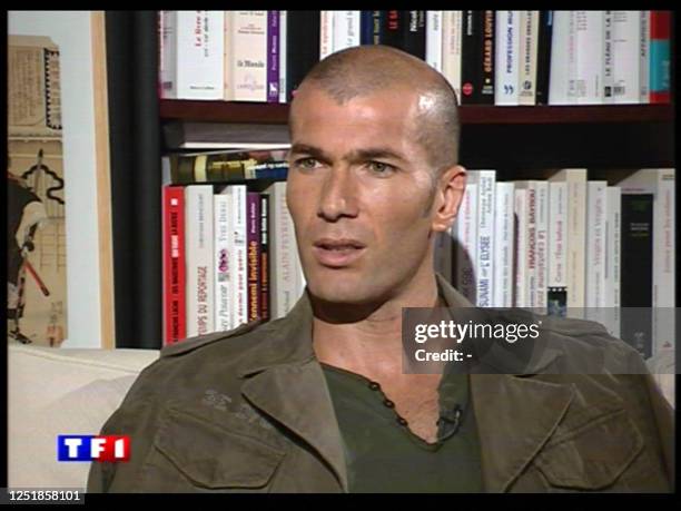 Grab taken 12 July 2006 shows French football team midfielder and captain Zinedine Zidane giving an interview on French television channel TF1 to...