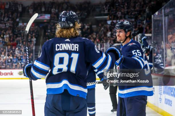 Mark Scheifele and Kyle Connor of the Winnipeg Jets celebrate a second period goal against the Nashville Predators at Canada Life Centre on April 08,...