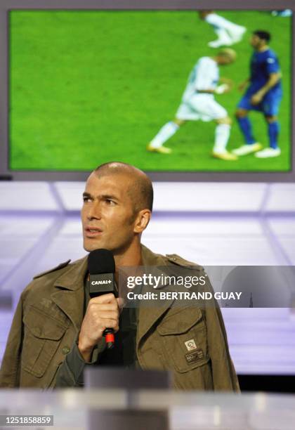 French football team midfielder and captain Zinedine Zidane gives an interview on French television channel Canal Plus to explain his version of the...