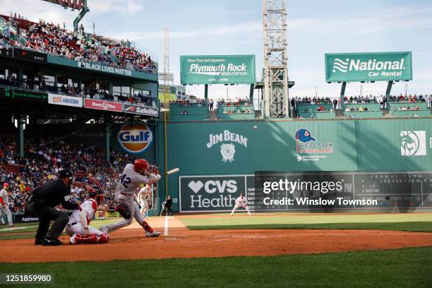 Gio Urshela of the Los Angeles Angels follows through on his grand slam home run against the Boston Red Sox during the first inning at Fenway Park on...