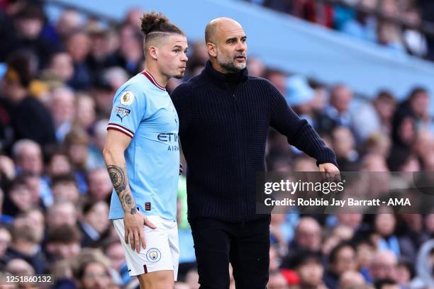 Kalvin Phillips of Manchester City and Pep Guardiola the head coach / manager of Manchester City during the Premier League match between Manchester...