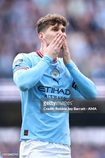 John Stones of Manchester City celebrates after scoring a goal to make it 1-0 during the Premier League match between Manchester City and Leicester...