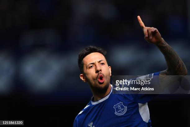 Dwight McNeil of Everton celebrates scoring the first goal during the Premier League match between Everton FC and Fulham FC at Goodison Park on April...