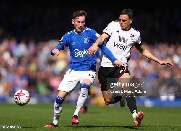 James Garner of Everton tangles with Joao Palhinha of Fulham during the Premier League match between Everton FC and Fulham FC at Goodison Park on...