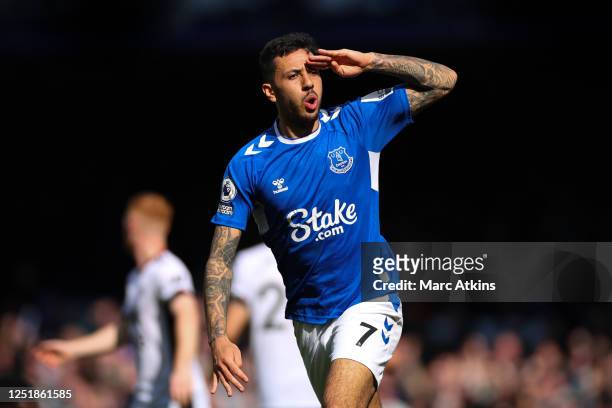 Dwight McNeil of Everton celebrates scoring the first goal during the Premier League match between Everton FC and Fulham FC at Goodison Park on April...