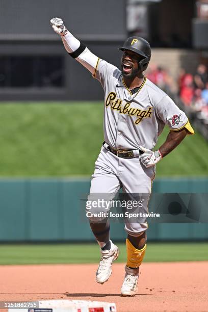 Pittsburgh Pirates designated hitter Andrew McCutchen pulls the sword in celebration of his two run homerun in the top of the 10th inning during the...