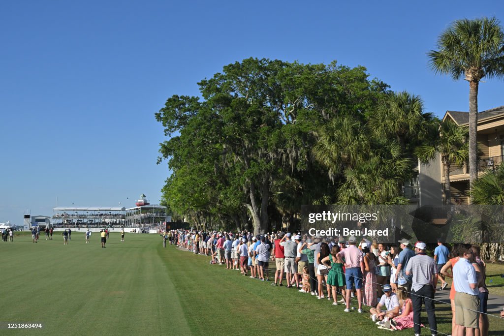 Fans watch play along the 18th hole during the third round of the RBC ...