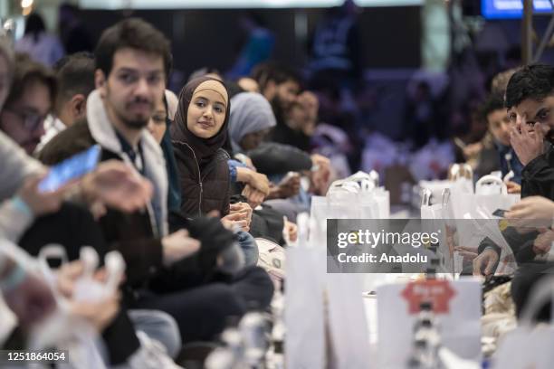 People attend an open Iftar at Wembley Stadium to mark the final week of holy month of Ramadan in London, United Kingdom on April 15, 2023. Open...