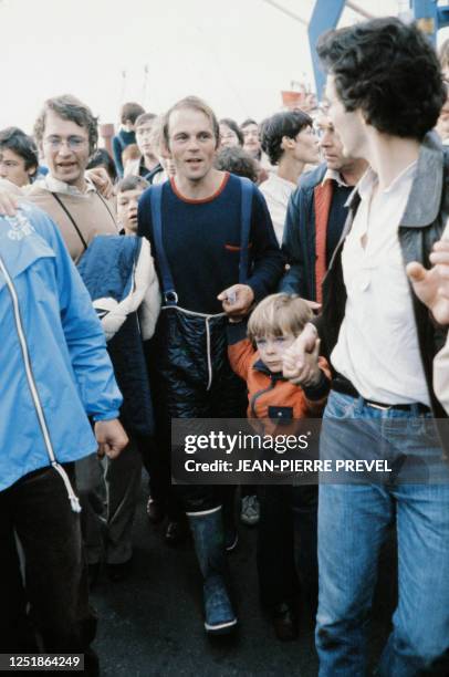 French oarsman Gérard d'Aboville is welcomed on September 21, 1980 in Brest harbor after he has completed his single-handed crossing of the Atlantic,...