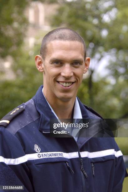 Picture released on August 14, 2008 by French gendarmerie shows French swimmer Hugues Duboscq wearing the uniform. Duboscq won Men's 200m...