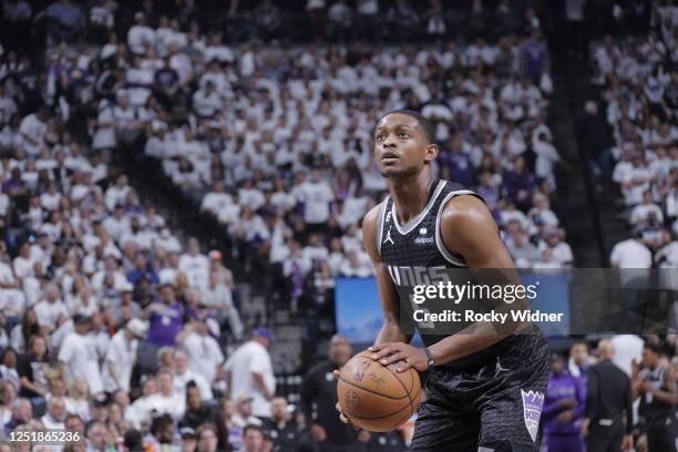 De'Aaron Fox of the Sacramento Kings prepares to shoot a free throw during Round One Game One of the 2023 NBA Playoffs against the Golden State...