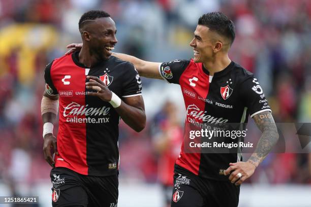Julian Quiñones of Atlas celebrates with teammate Luis Reyes after scoring the team's fourth goal during the 15th round match between Atlas and...