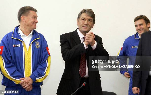 Ukraine's President Viktor Yushchenko greet players of the football National team of Ukraine while main coach Oleg Blokhin and football star Andriy...