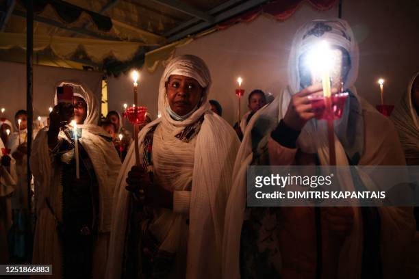 Christian Ethiopians living in Greece attend a midnight Mass on the Eve of the Resurrection of Jesus at the Ethiopian Coptic Church in Athens, Greece...